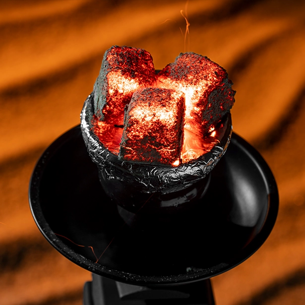 cube charcoal closeup on hookah
